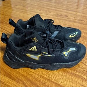 Adidas Black Sneakers with Gold Highlights